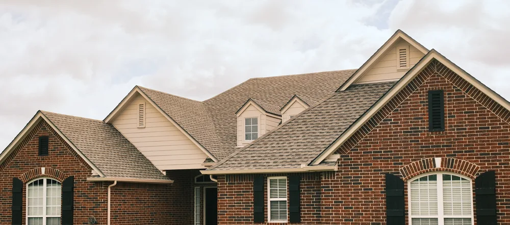 Home with a completed R&R roof in the Tulsa metro