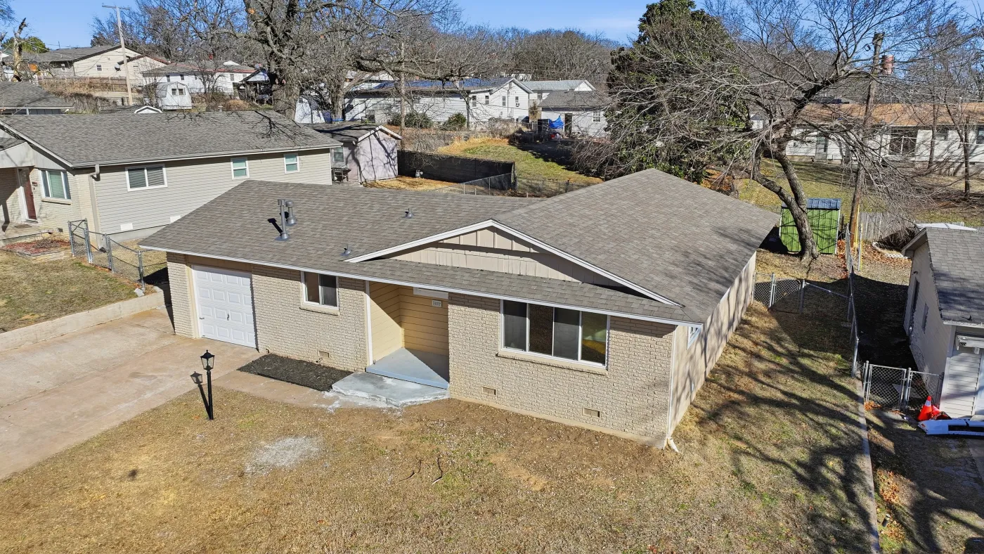 Home with a completed R&R roof in the Tulsa metro