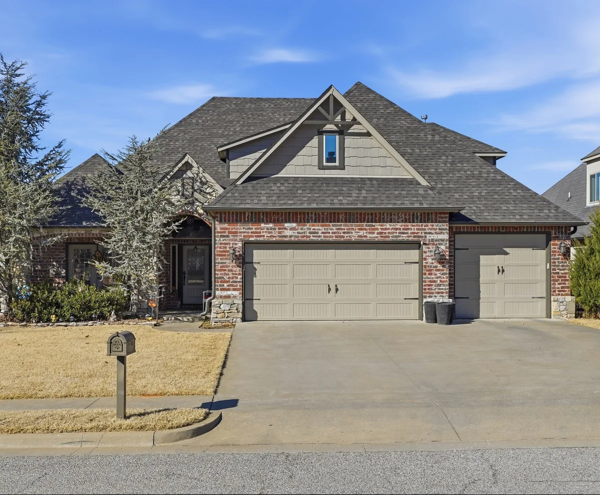 Brick home in the Tulsa metro with seamless gutters along the roofline